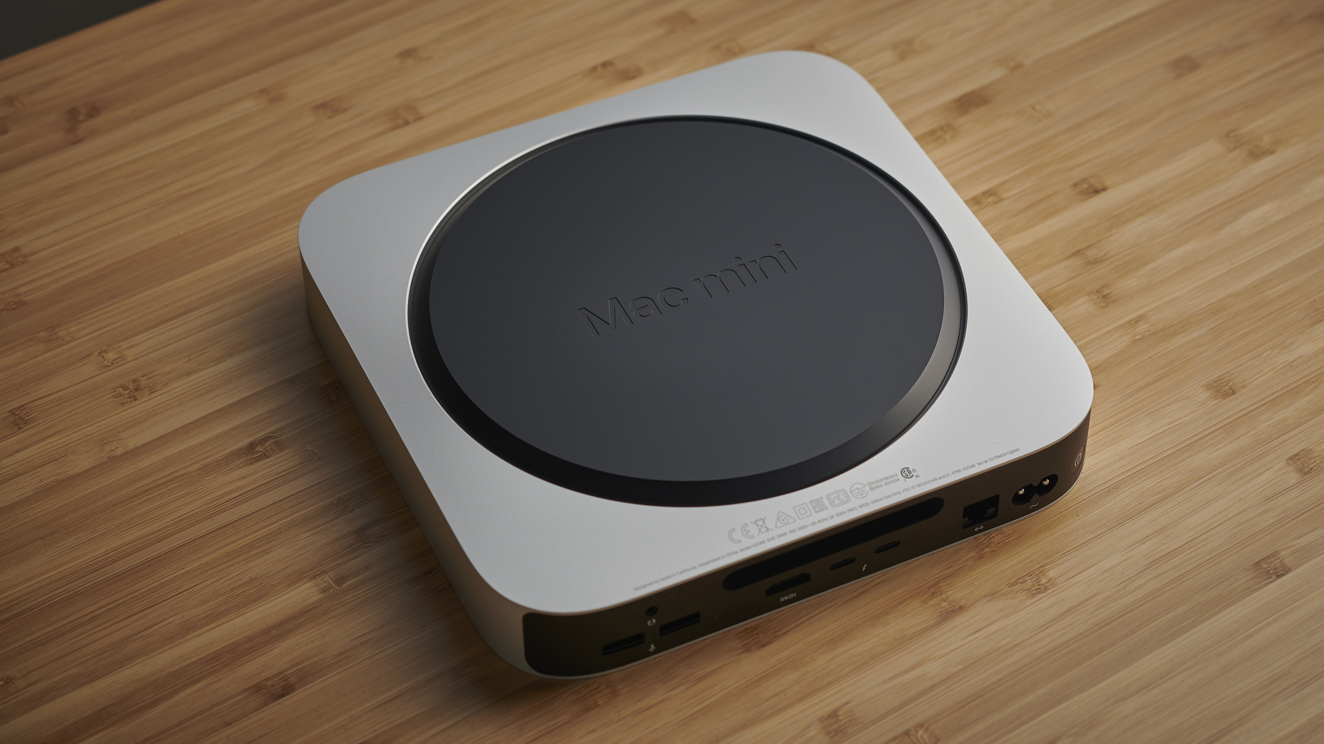 Apple Mac mini (M1, 2020) on a wooden desk