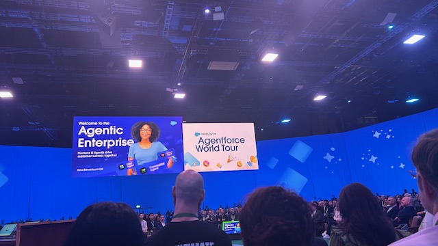 Salesforce World Tour stage with TV screen header 