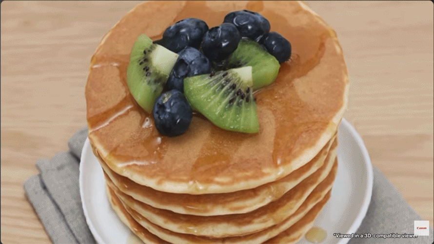 Canon's Dual Pixel 3D software render of a stack of pancakes topped with blueberries, kiwi and syrup