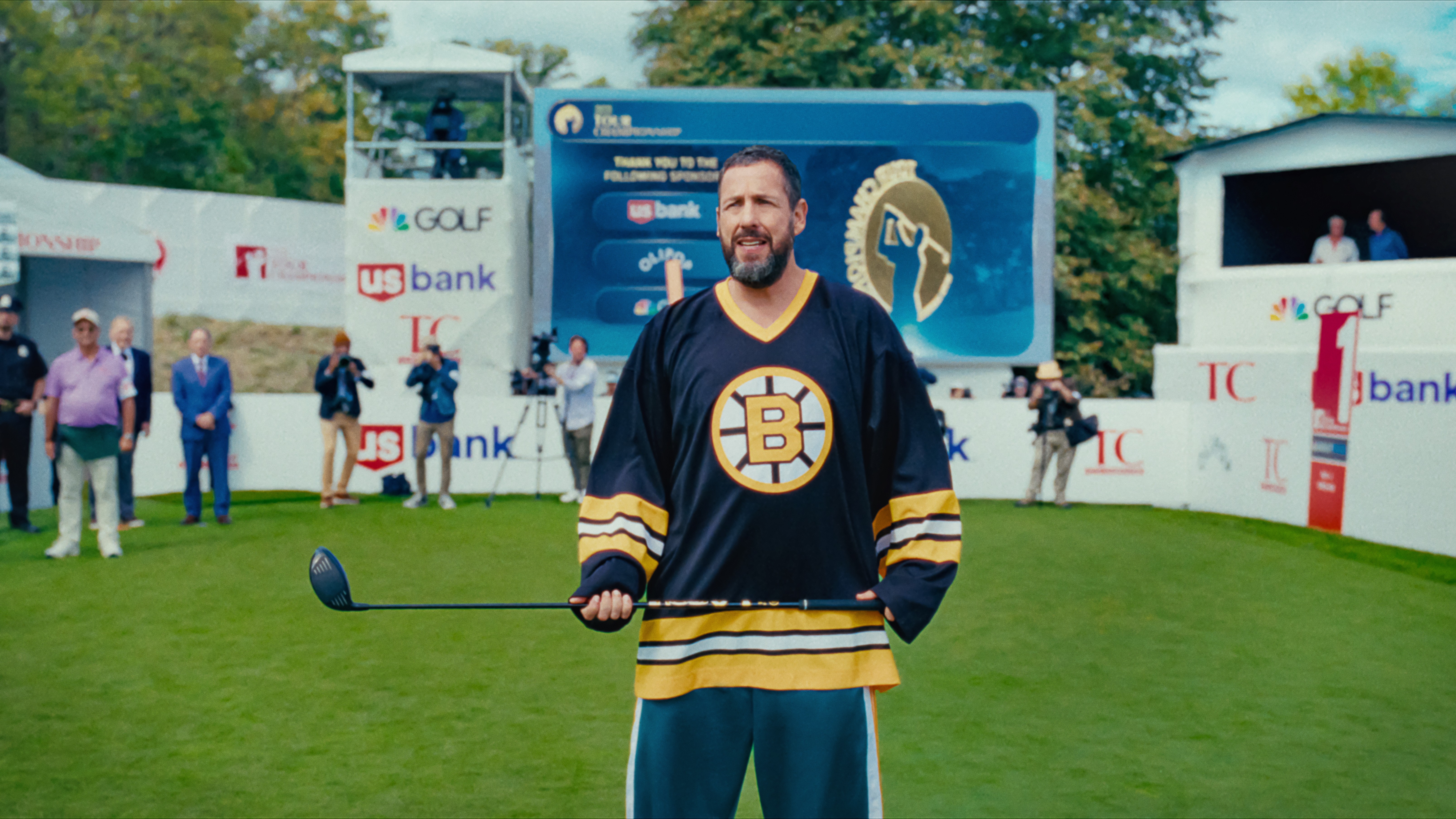Adam Sandler holding golf club in a still from Happy Gilmore 2