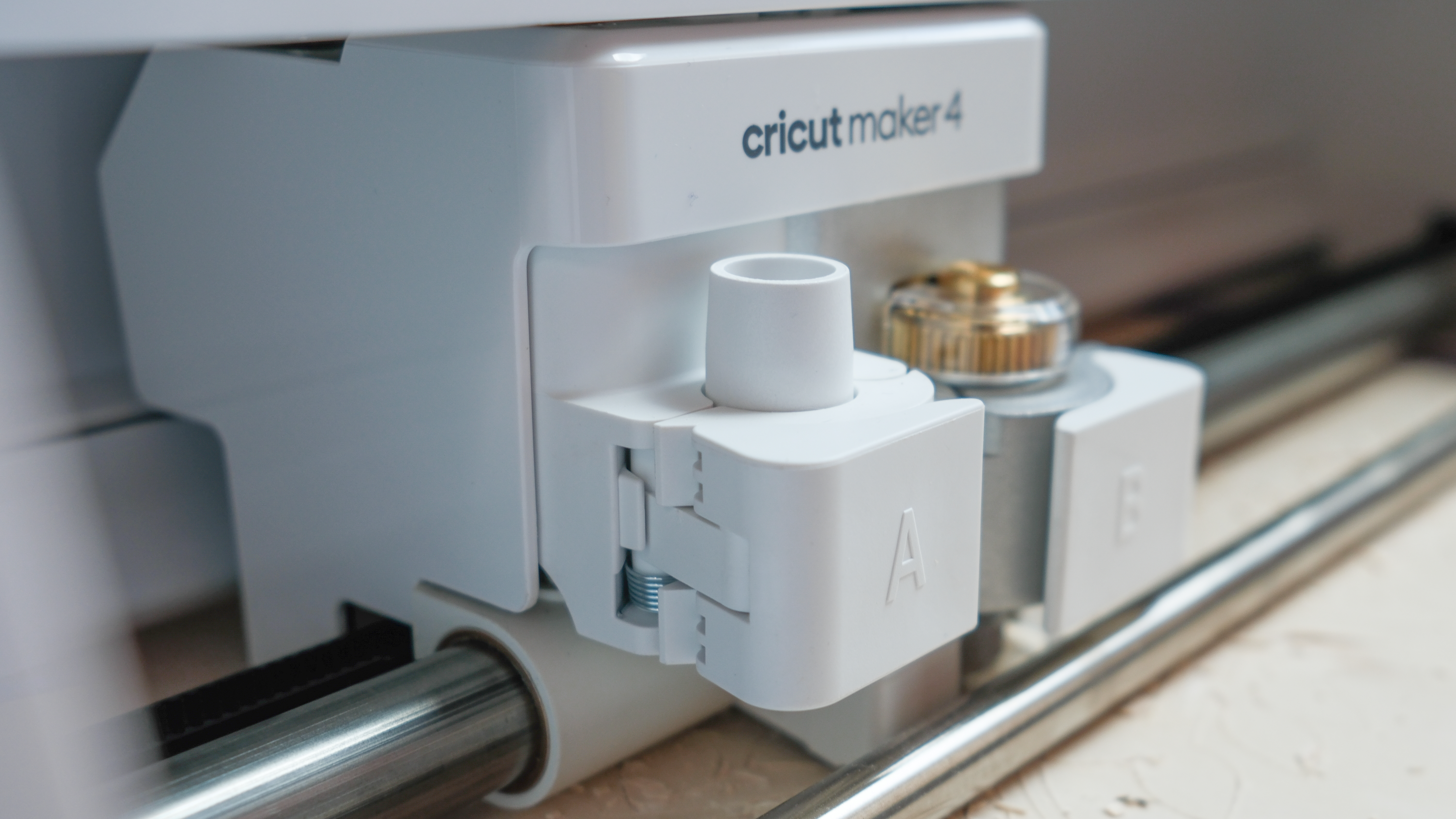 Cricut Maker 4 cutting machine making projects with basswood and cardstock