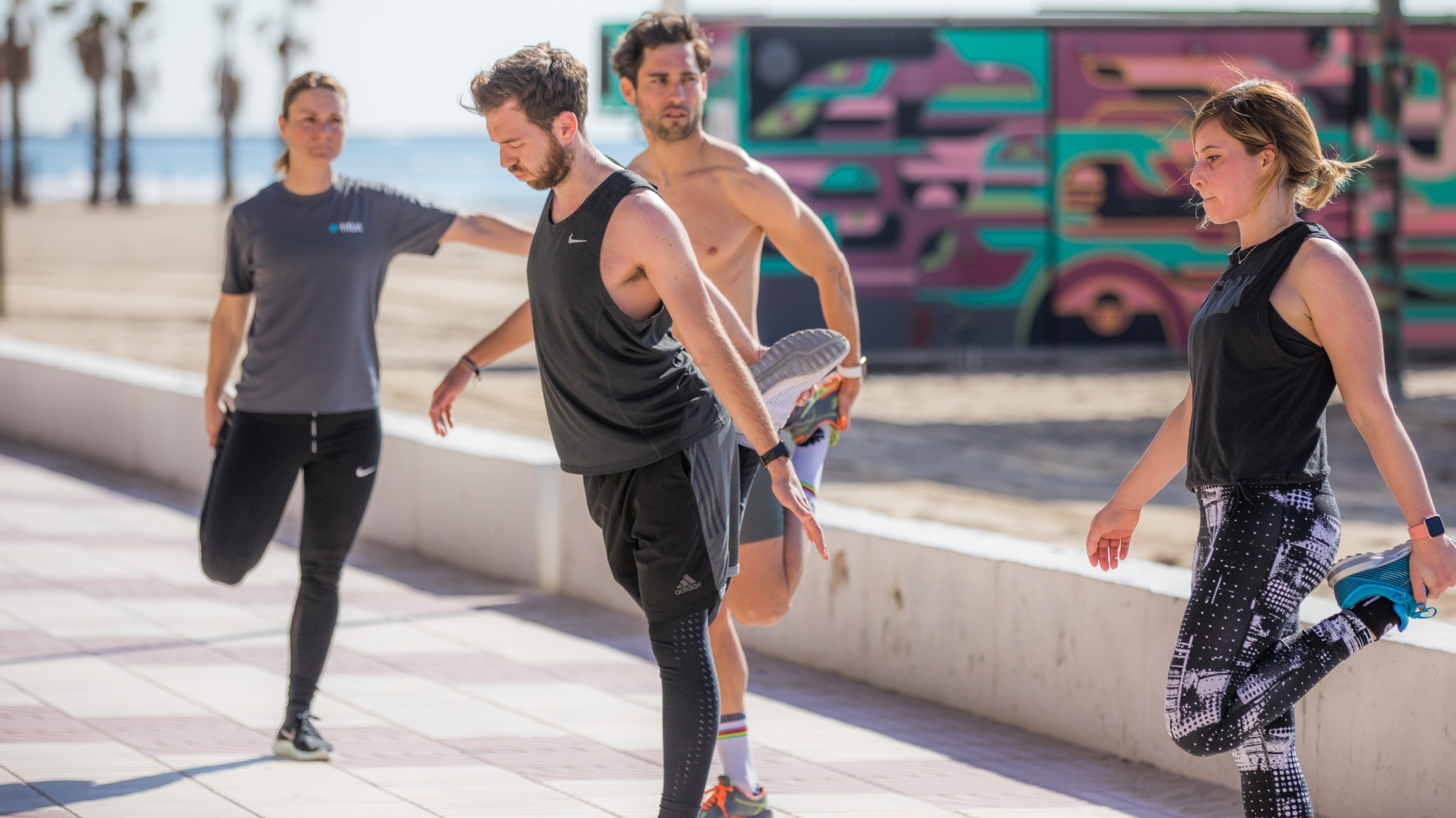 Fitbit users performing calf stretches