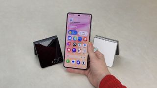 Samsung Galaxy Z Flip 8 held in-hand.