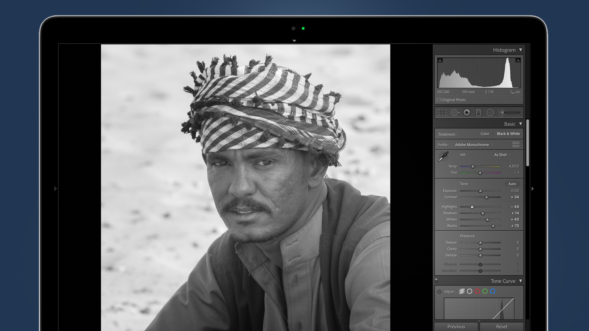 A portrait Lightroom preset on a MacBook screen