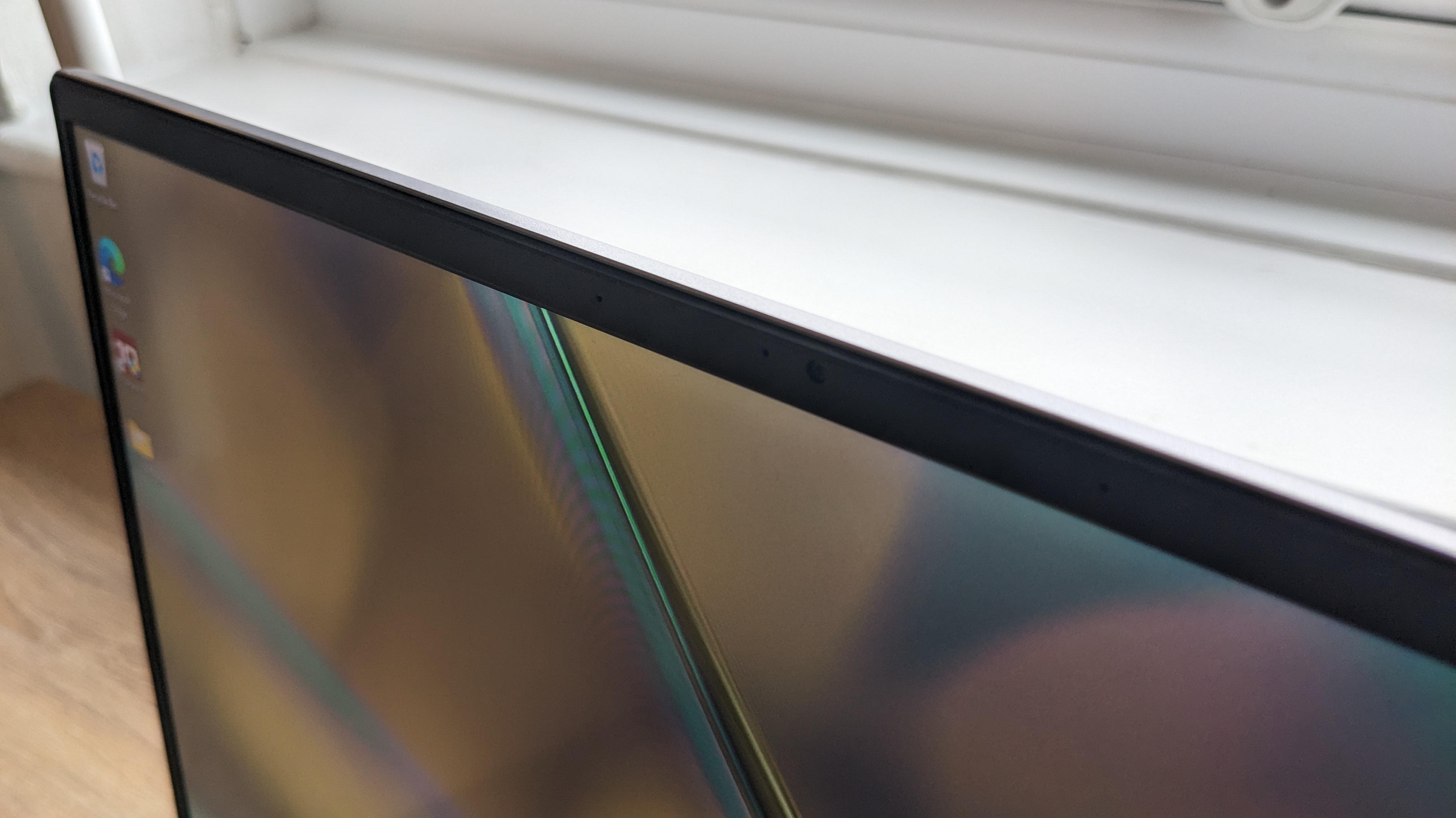 Acer Swift X 16 on wooden table