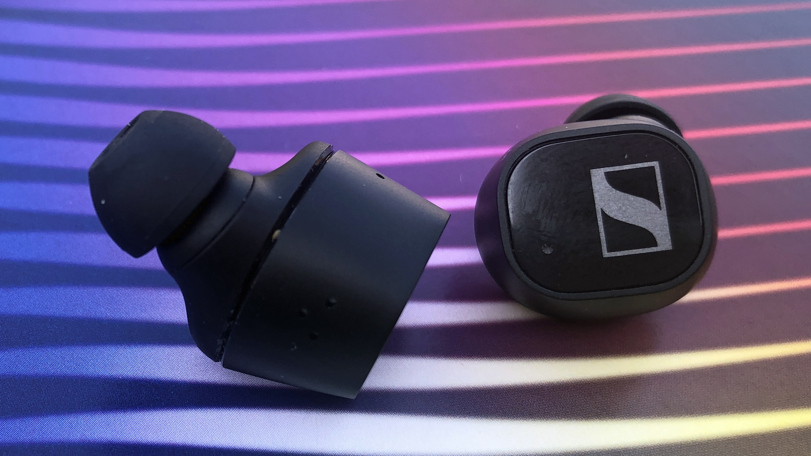a closeup of the sennheiser cx plus true wireless earbuds