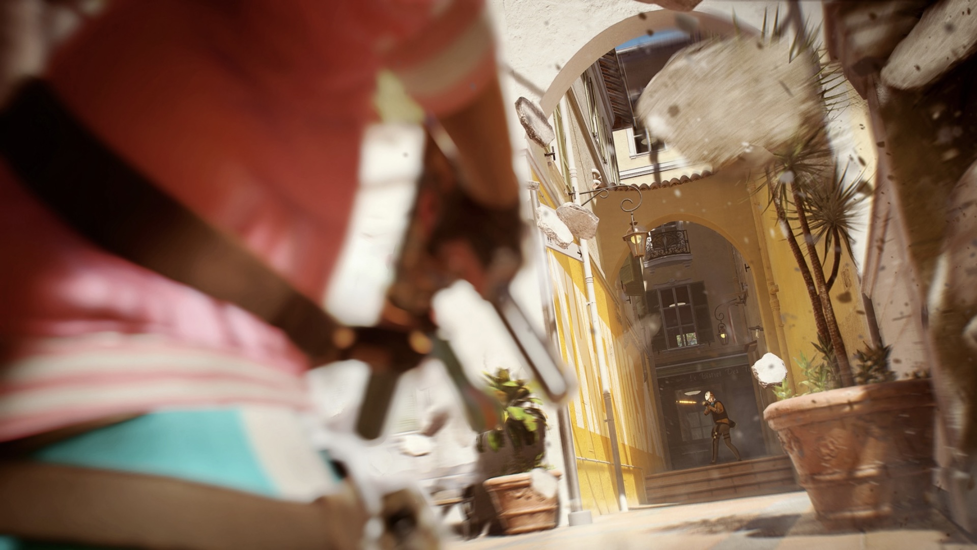 A close up shot of a player firing down an alleyway