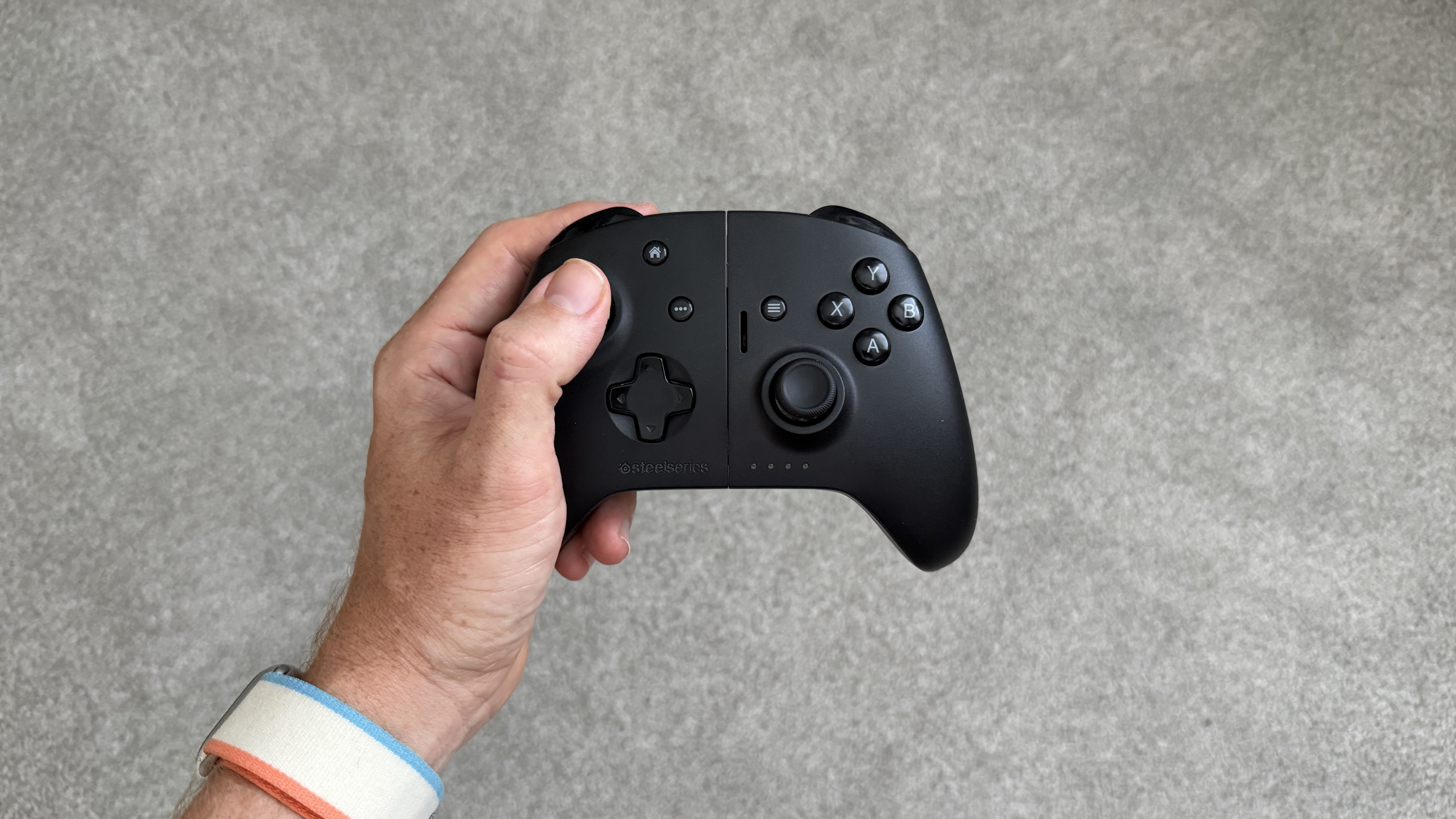 A photograph of the SteelSeries Nimbus Cloud mobile gaming controller.