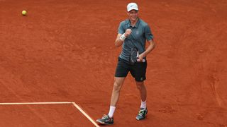 Jannik Sinner clenches his fist after winning a point on the ATP Tour 2026.