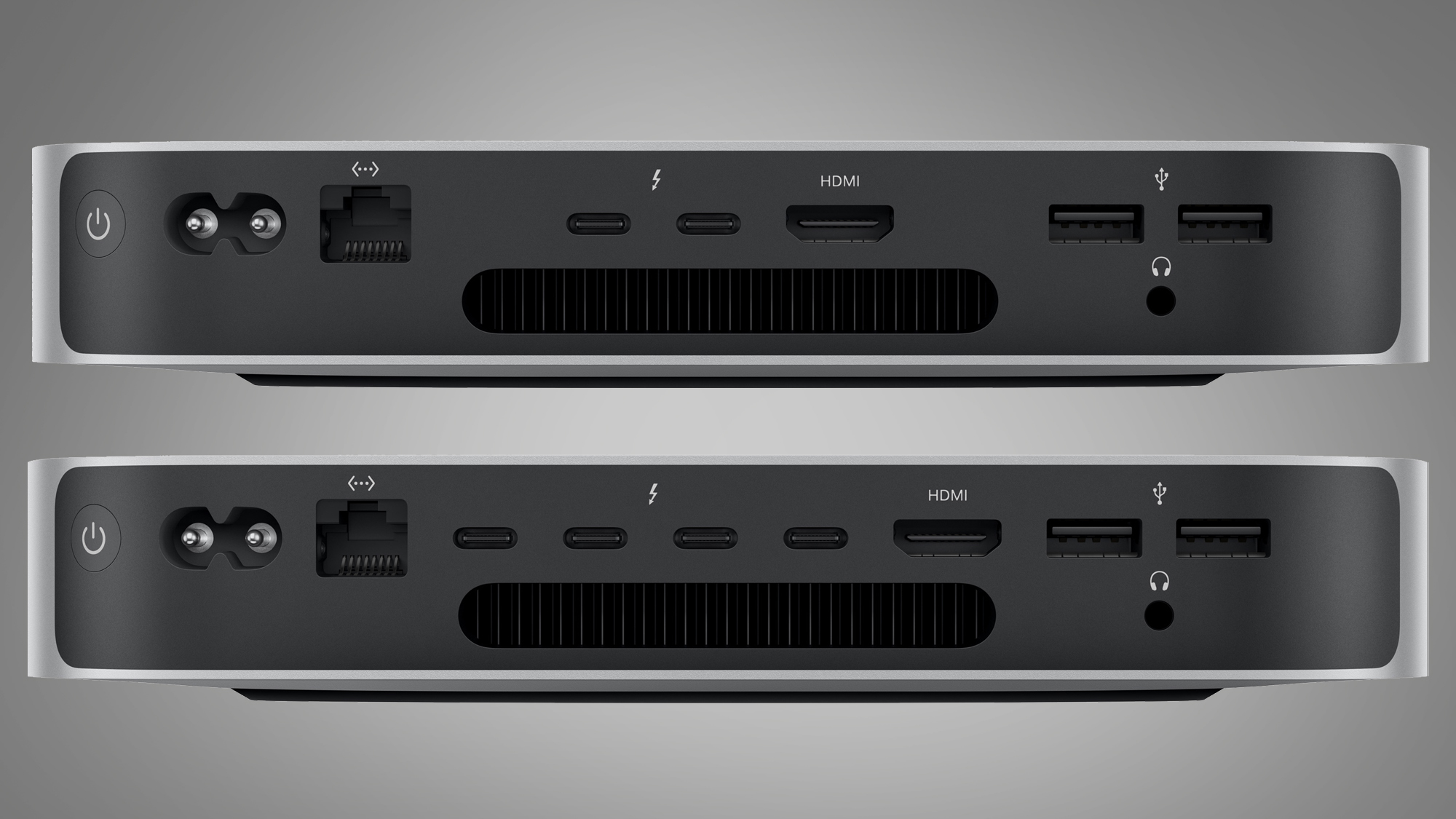 The back of the Apple Mac Mini M2 on a grey background