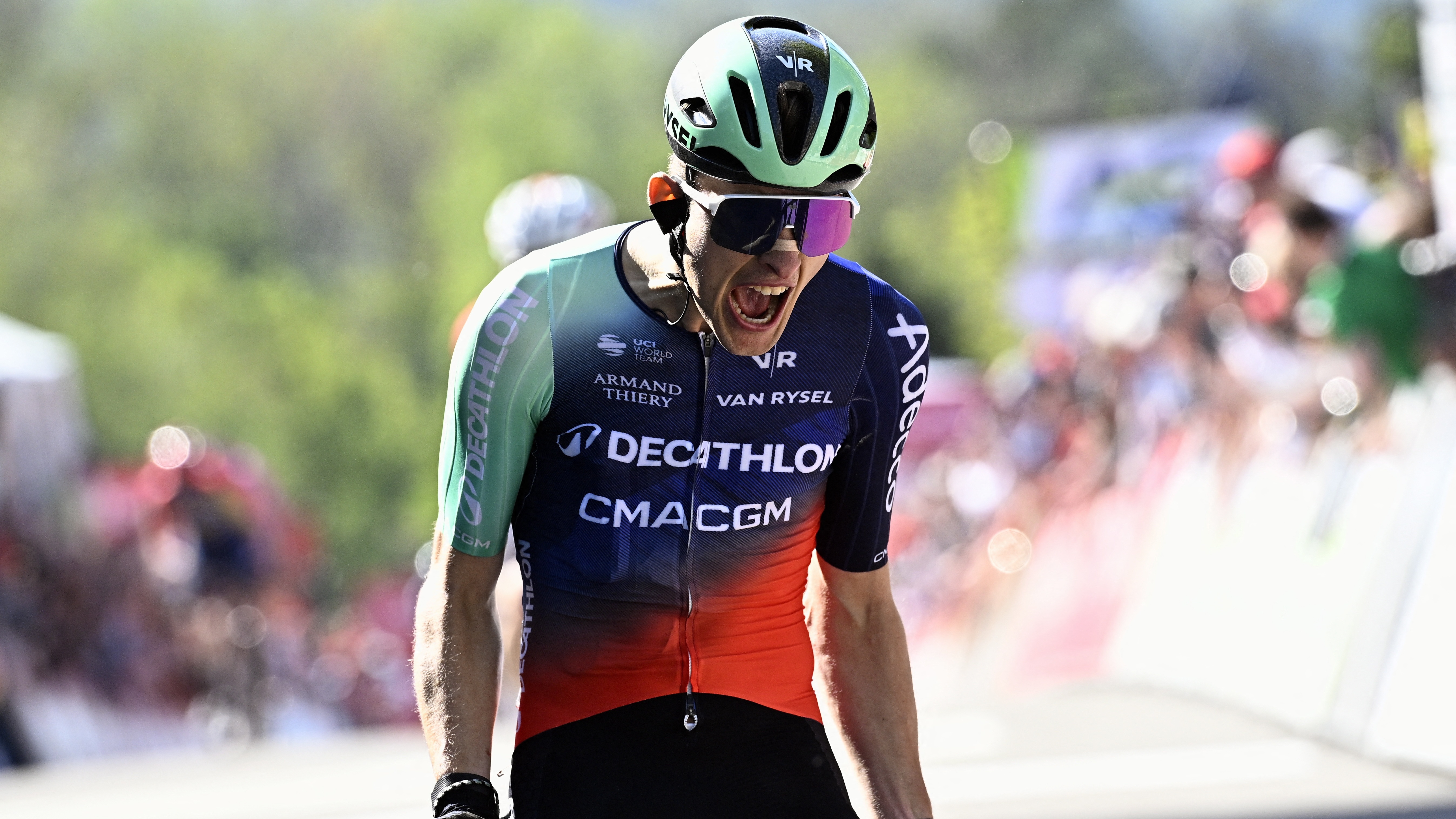 Decathlon CMA CGM Team's French Paul Seixas celebrates as he crosses the finish line to win 'La Fleche Wallonne' one day cycling race, 200 km from Herstal to Huy, on April 22, 2026.