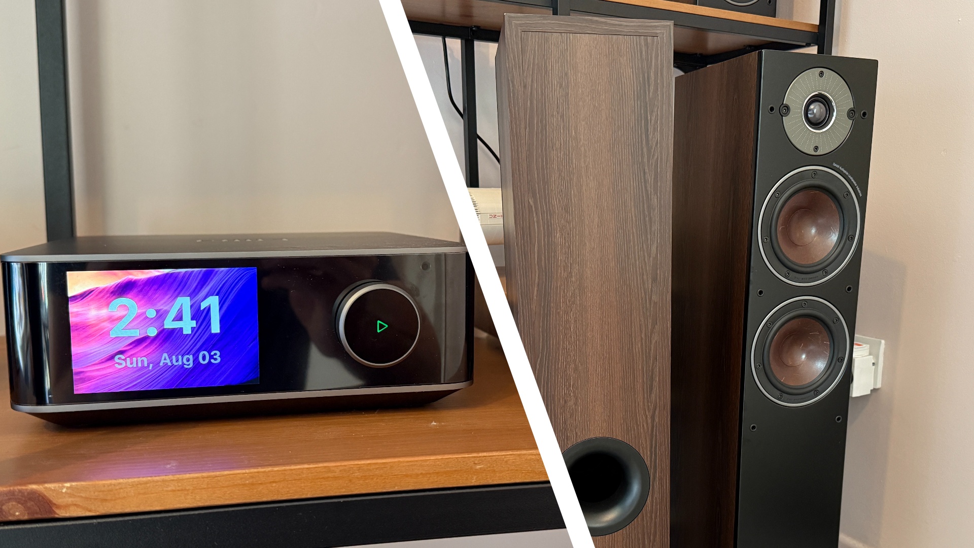 The WiiM Amp Ultra on a shelf, with a colorful image on its screen, and the Dali Oberon 5