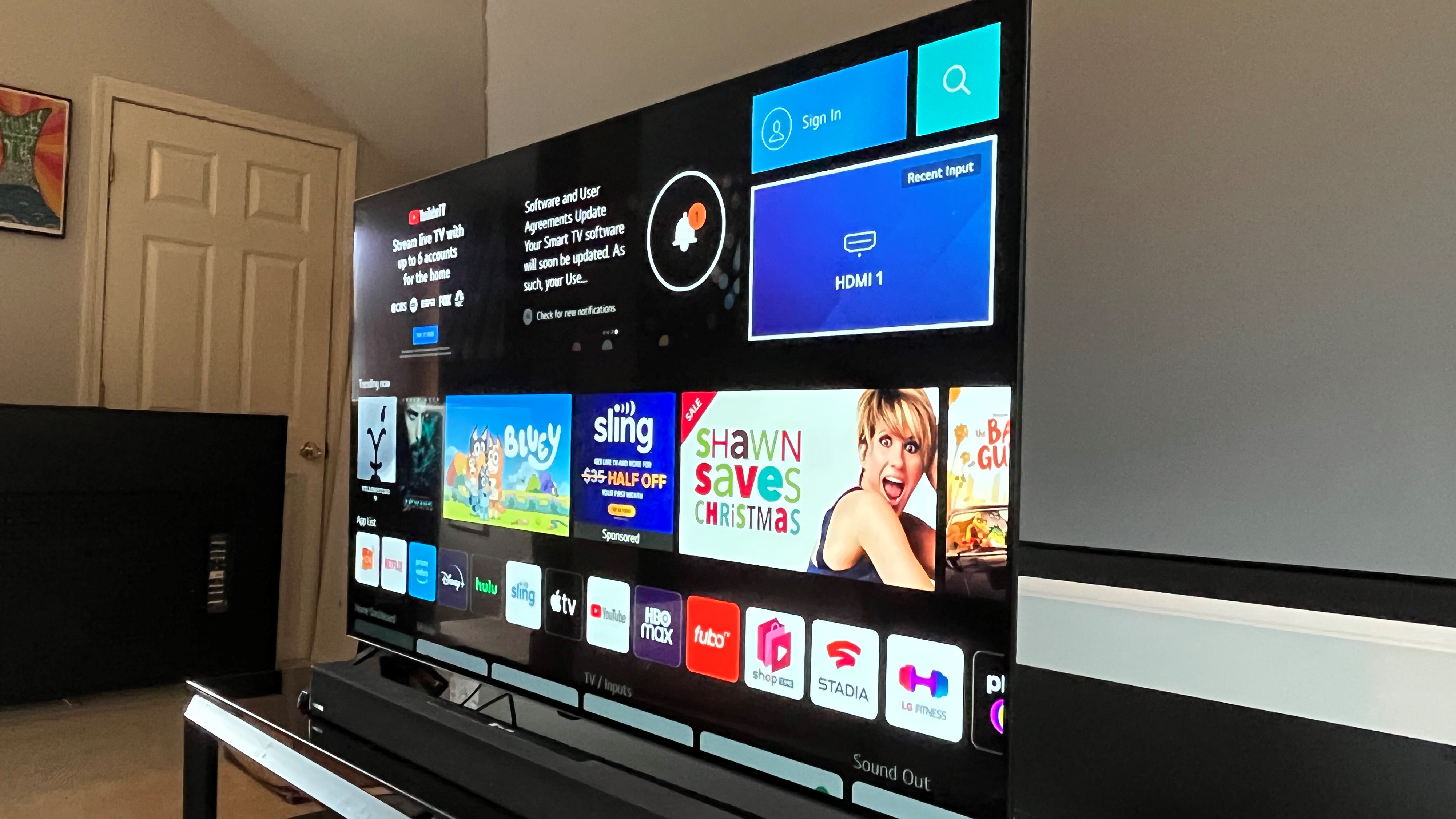 LG A2 OLED TV angled left showing smart interface