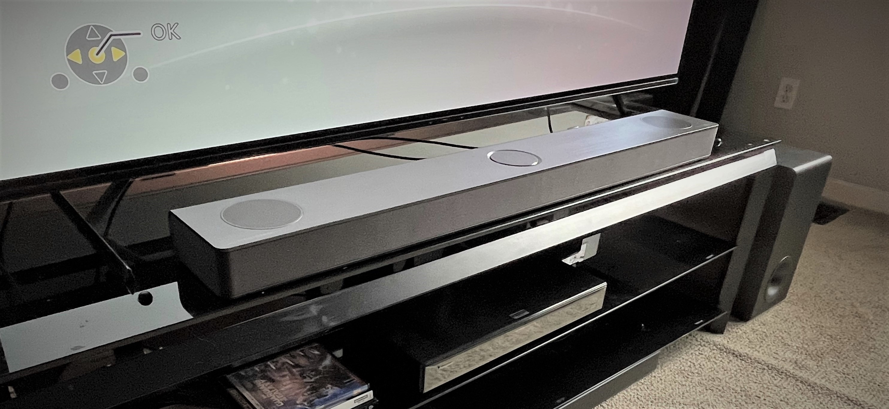 LG S80QY soundbar on TV stand