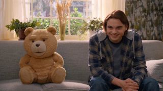 Seth MacFarlane (as the voice of Ted) and Max Burkholder in Ted
