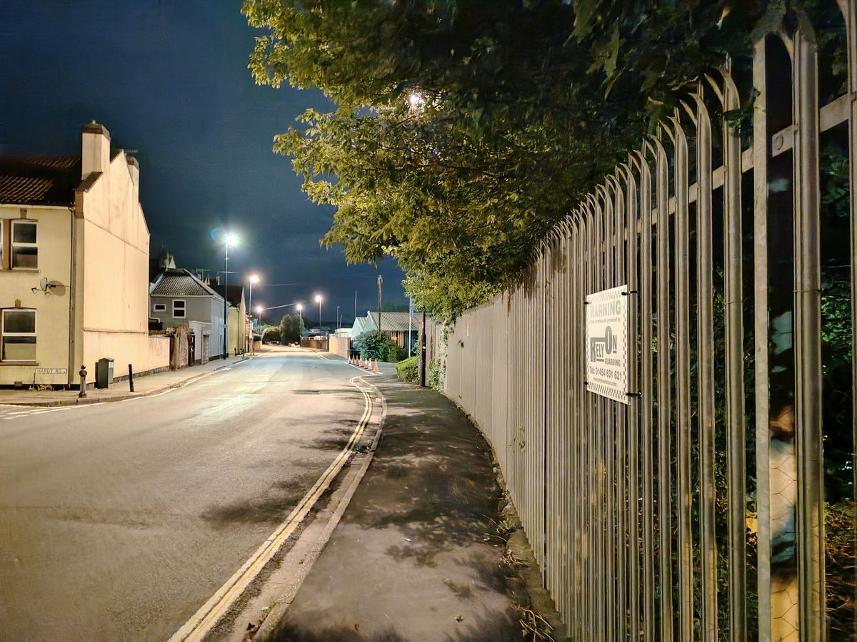 An image of a road at night
