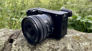 Sony Alpha A6700 mirrorless camera outside on a wall