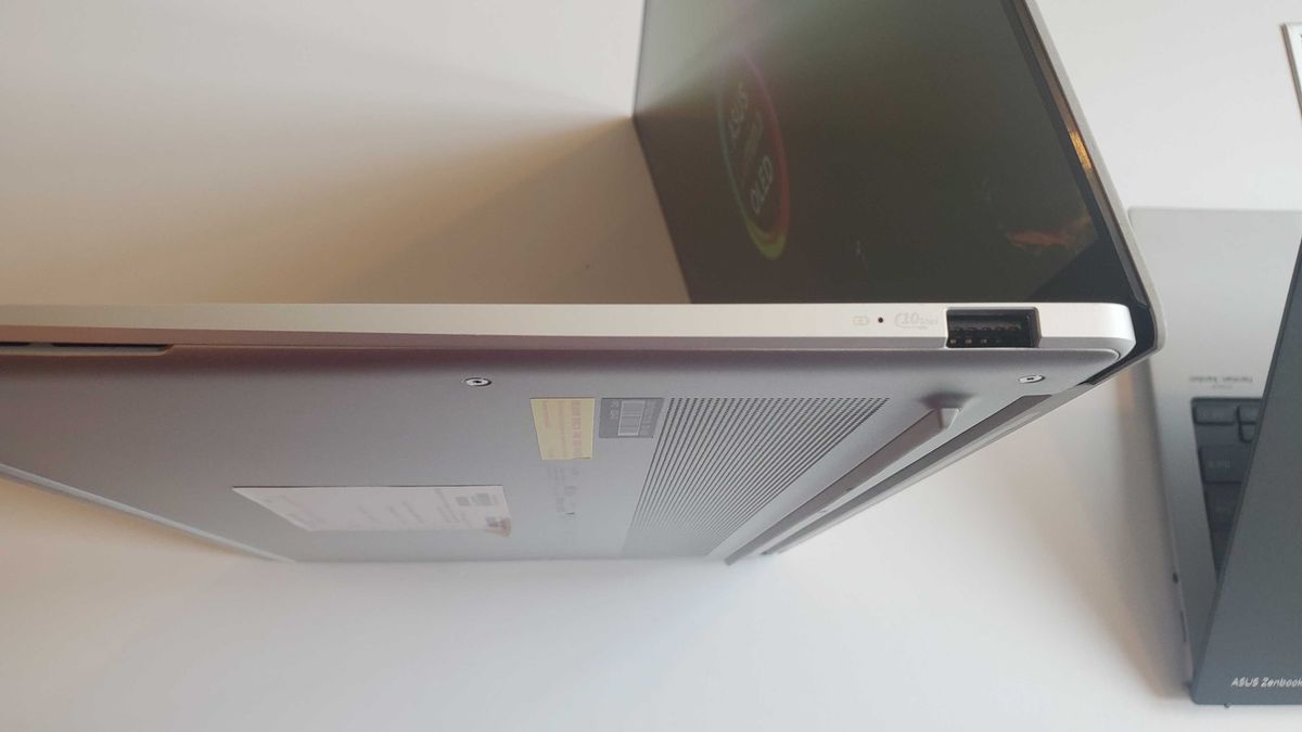 light silver laptop on table