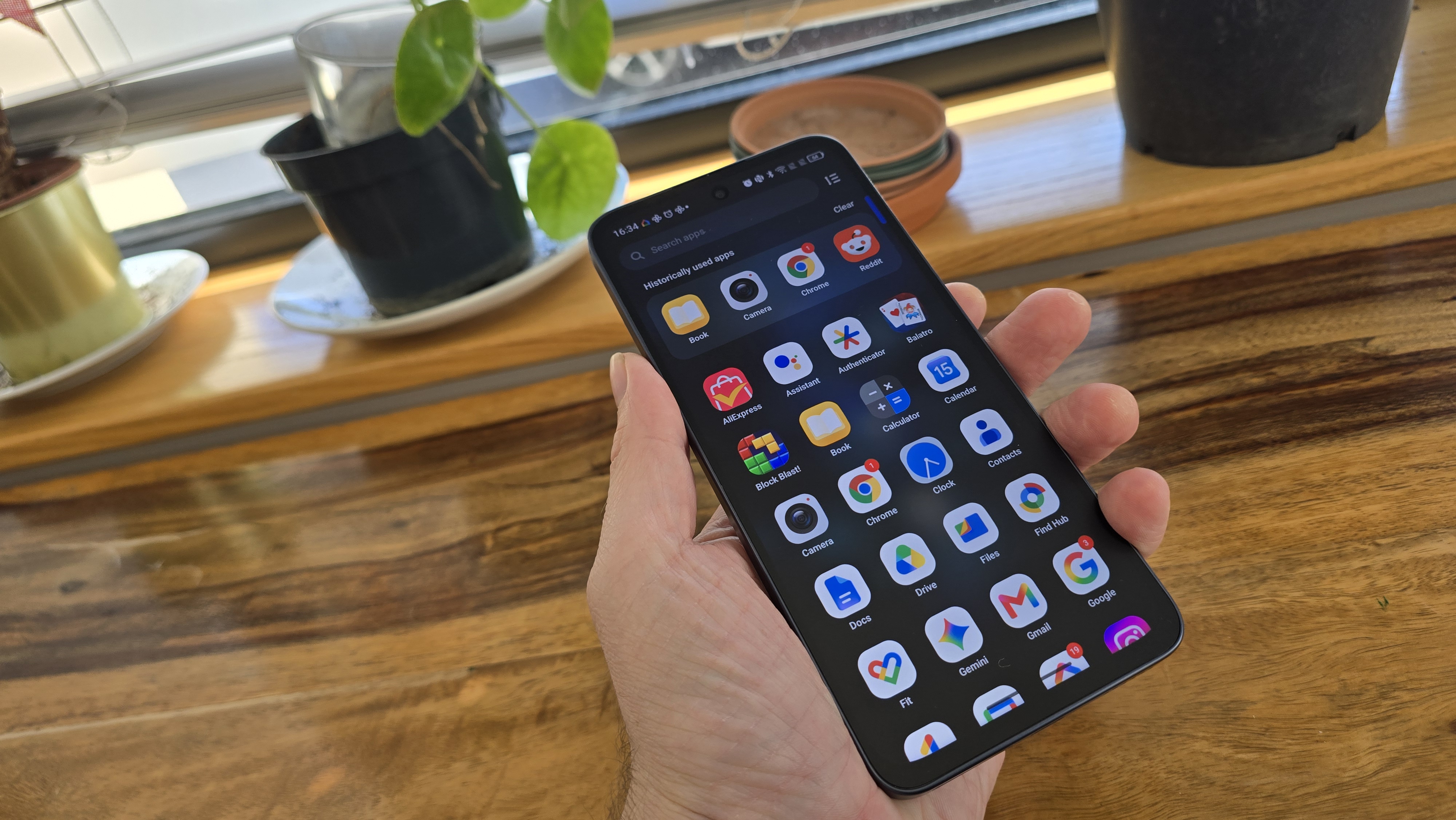 TCL NXTPAPER 70 Pro smartphone in an office and outdoors
