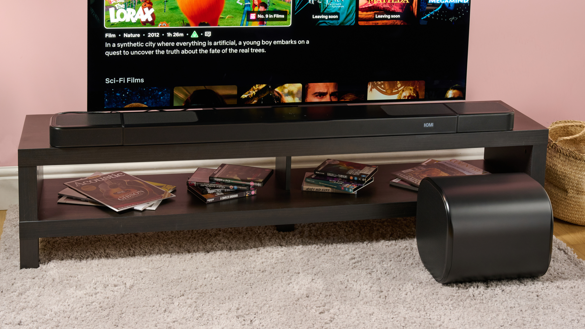 JBL Bar 1300MK2 soundbar surround speakers and sub alongside TV setup