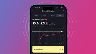 A phone on a pink and purple background showing the Fitbod app