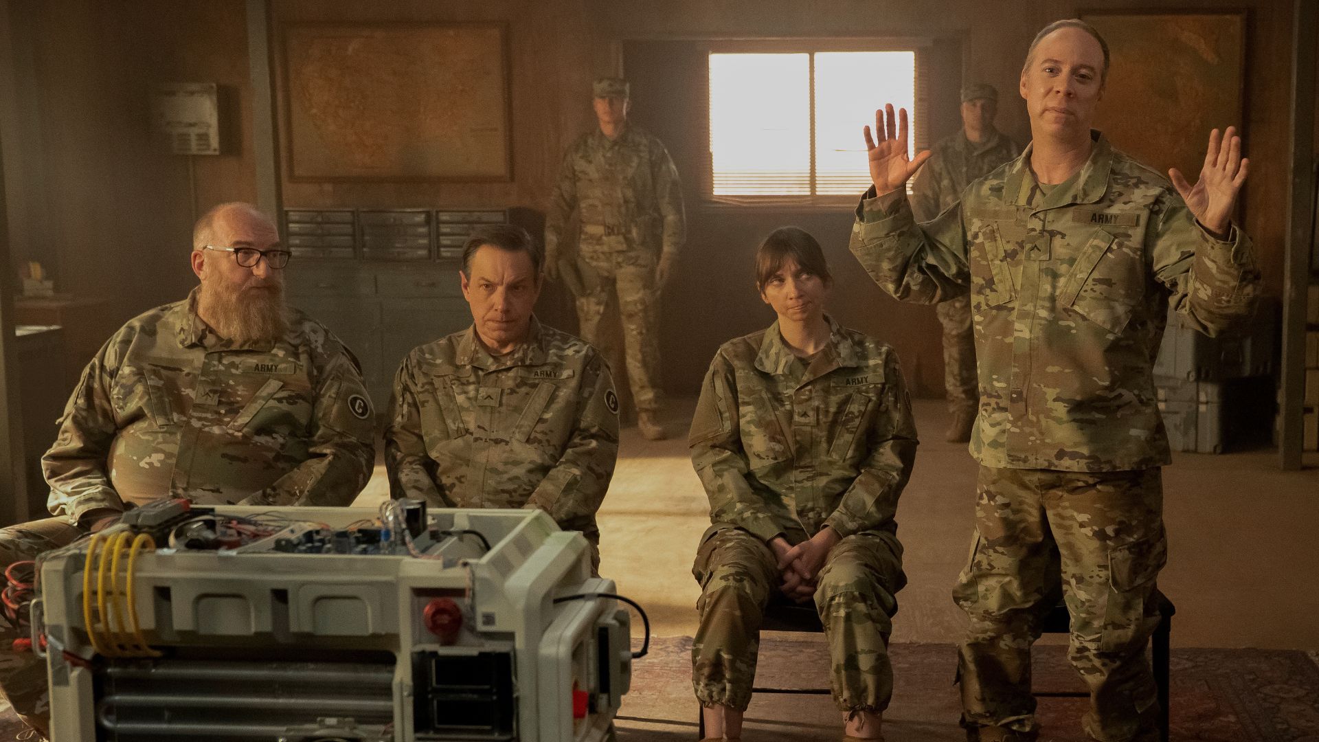 Bert, Kripke, Denise and Stuart are interrogated while wearing military uniform