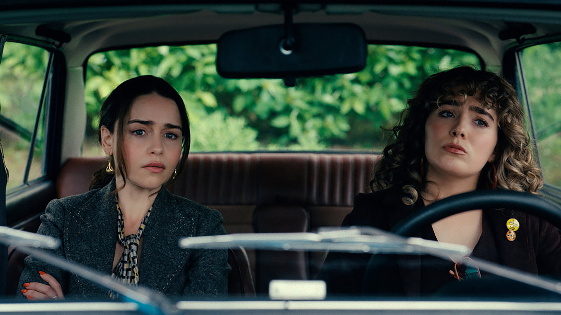 Bea and Twila sitting in a car in Ponies