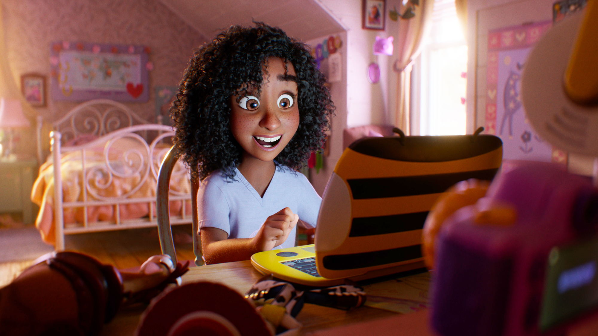 Blaze smiling as she sit looking at her laptop screen in Toy Story 5