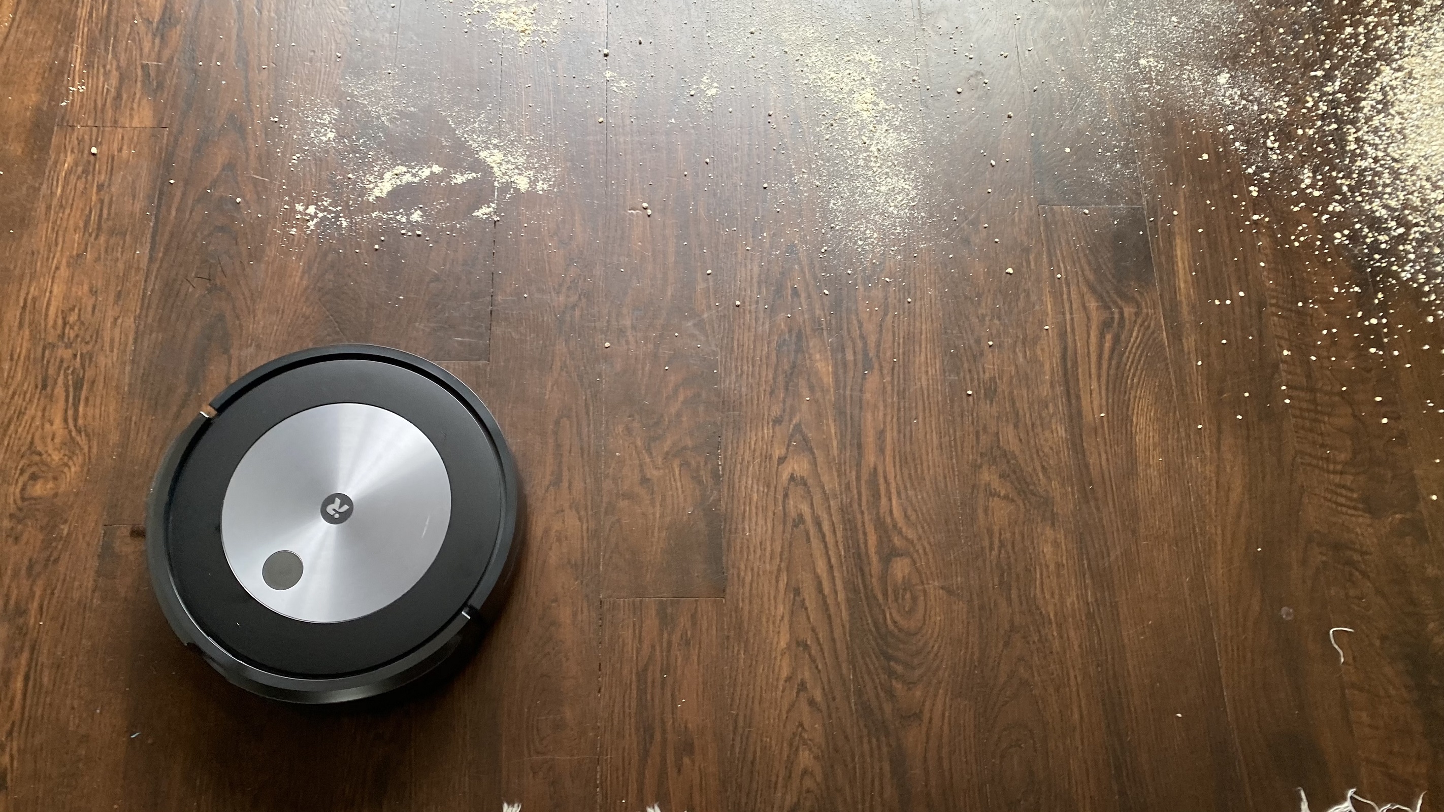 irobot j7 plus with crumbs on hard floor