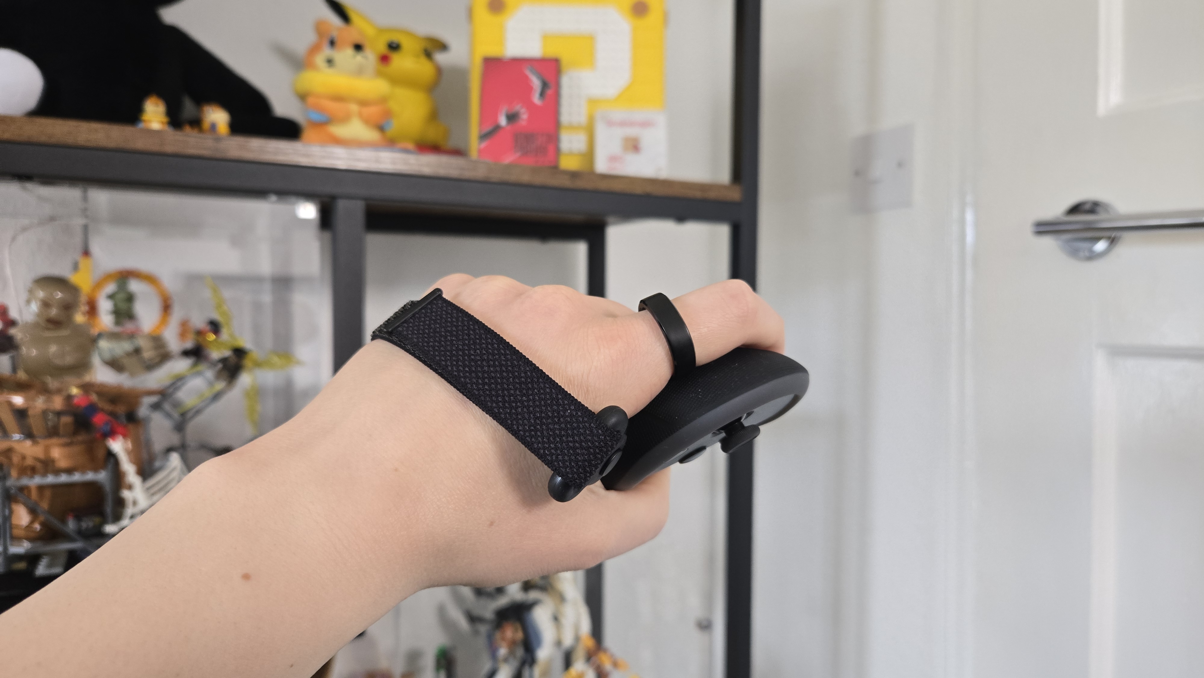 The Kiwi design G4 Pro Performance Controller Grips being held