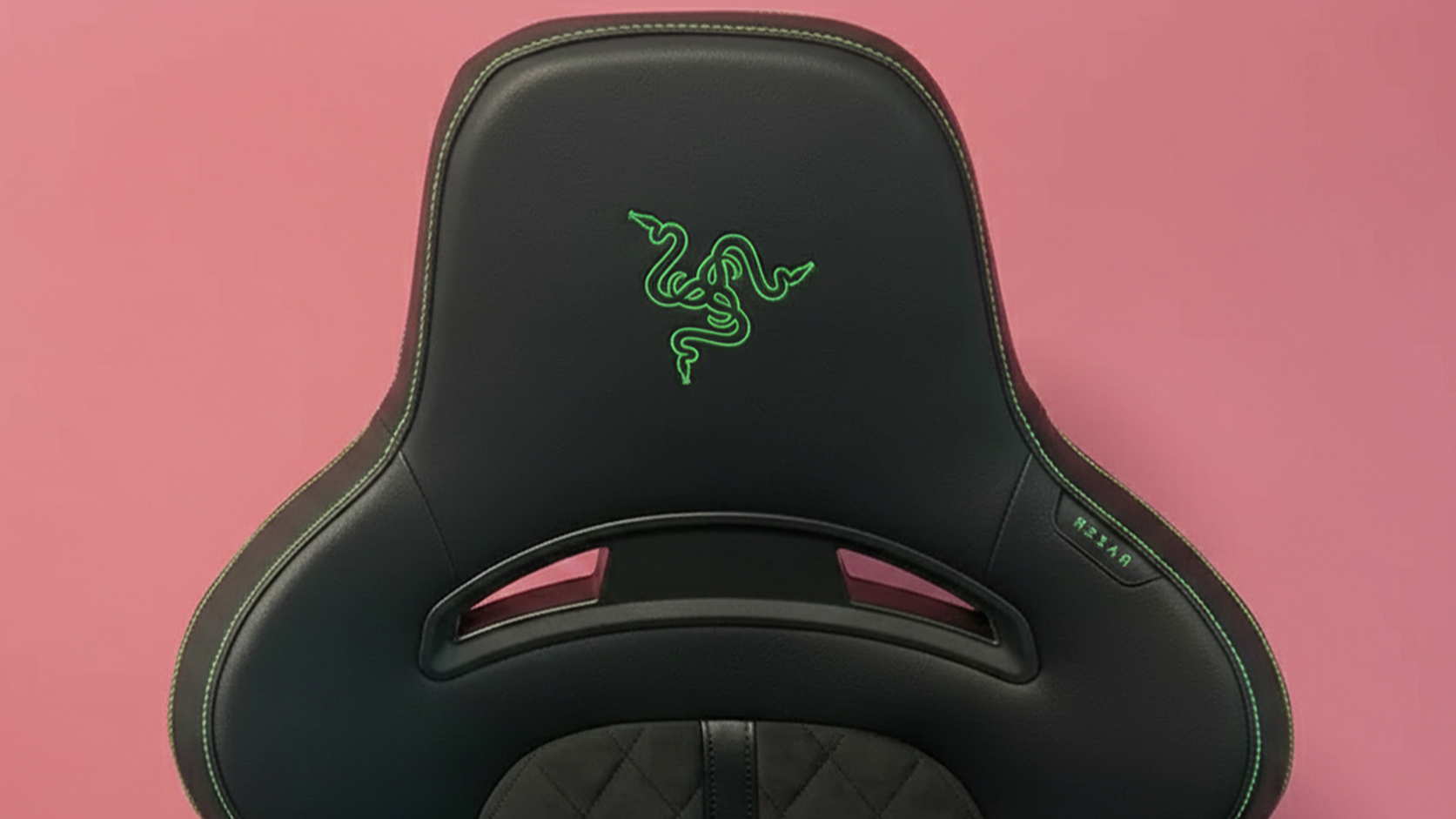 The Razer Enki Pro gaming chair in a colorful gaming and office set-up.