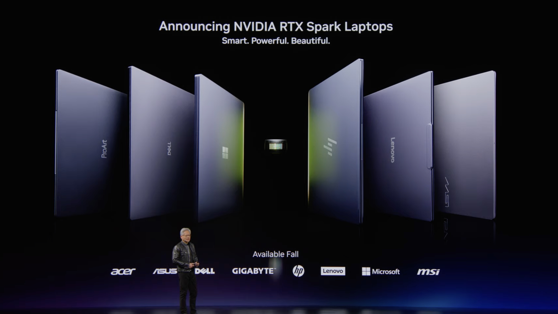 Nvidia CEO on a stage with laptops behind him saying RTX Spark