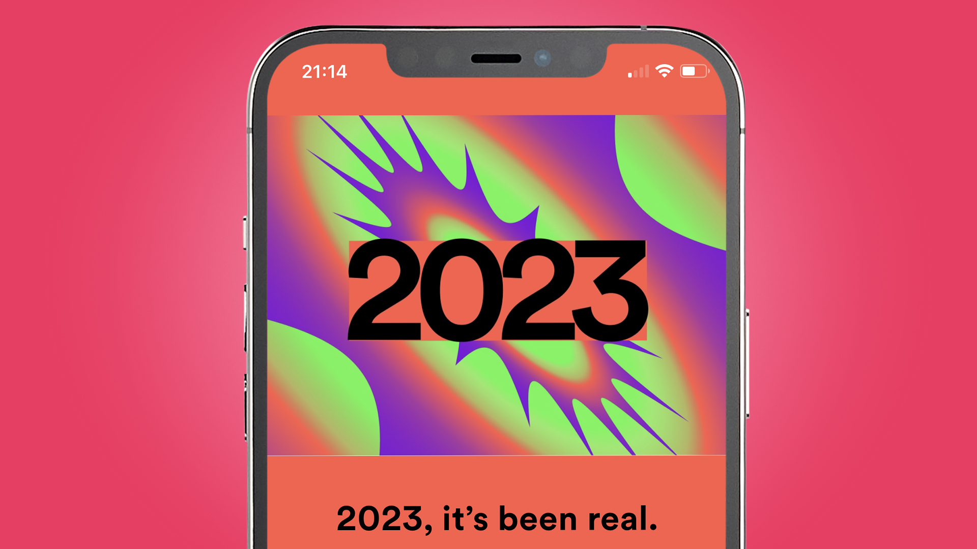 An iPhone on a pink background showing a splash page for Spotify Wrapped 2023