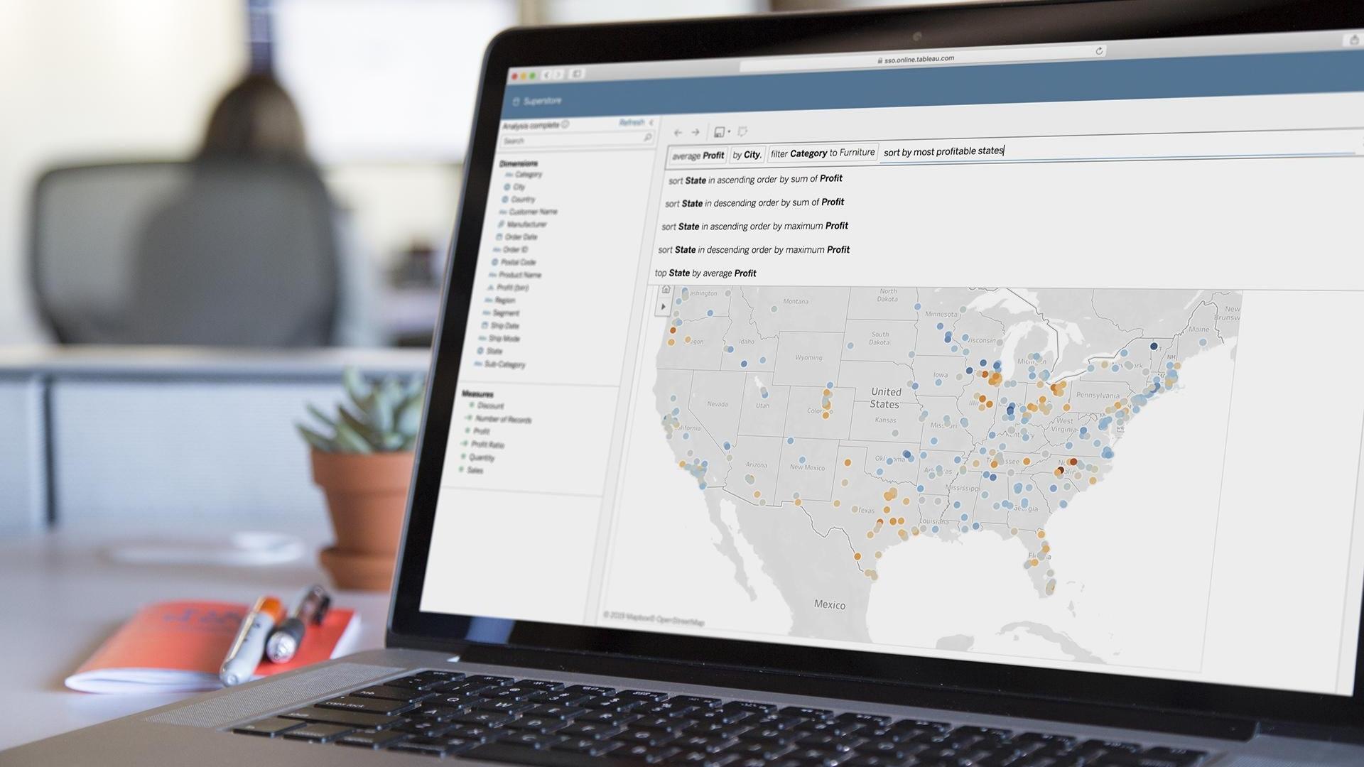 Laptop showing Salesforce Lightning Tableau data dashboard