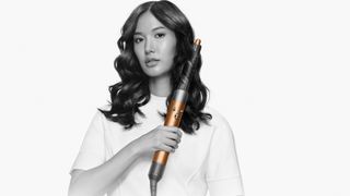 The Dyson Airwrap being used to curl hair