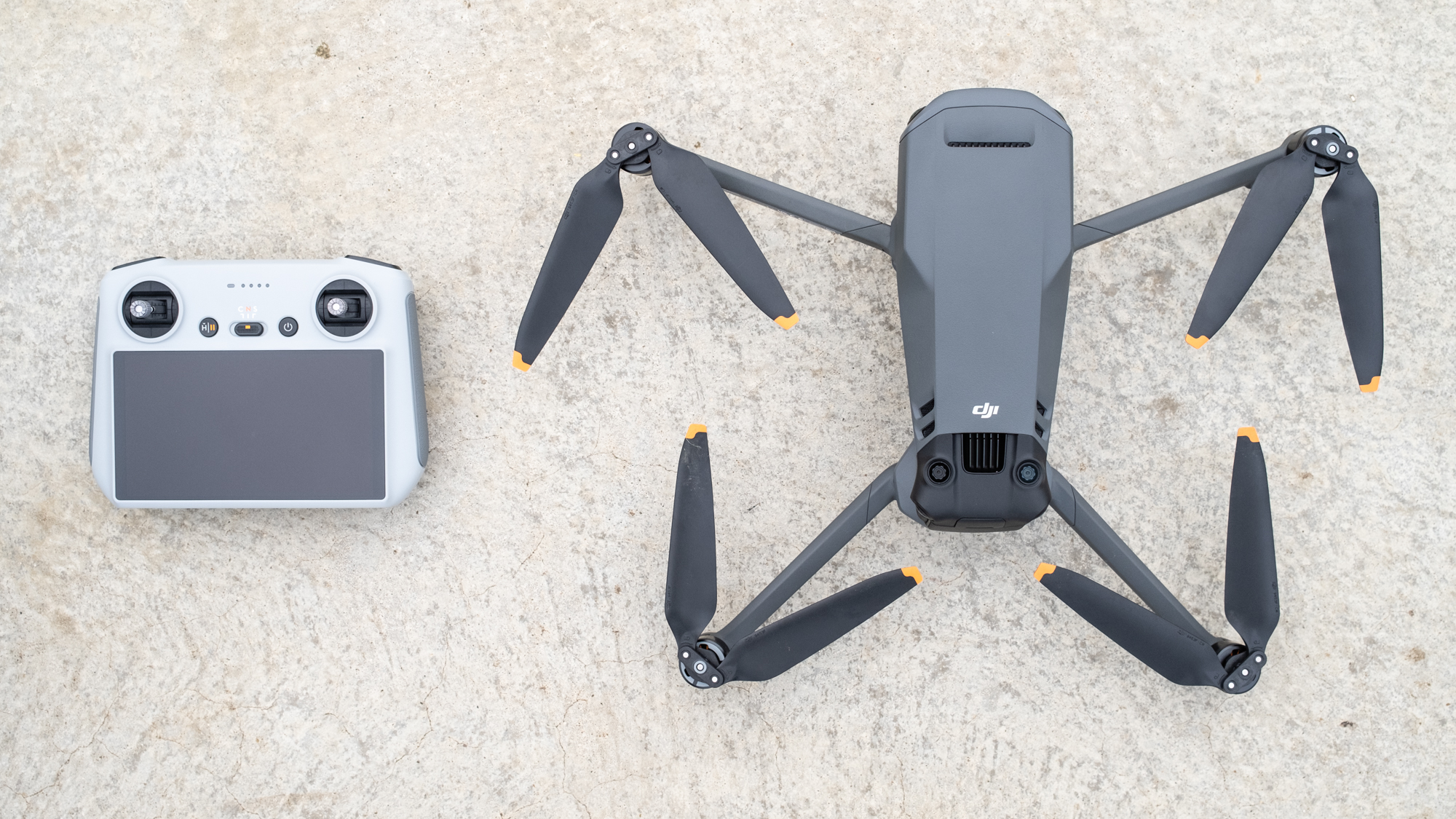 DJI Mavic 3 Classic and RC controller with propellers folded out