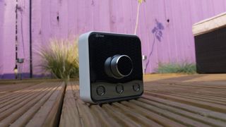 The Hive Thermostat on wooden decking
