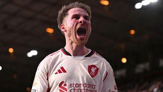 A closeup of Liverpool's Alexis Mac Allister celebrating scoring the winner against Nottingham Forest.
