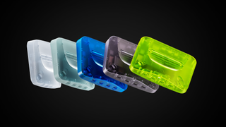 Analogue 3D's translucent colorways: Glacier, Ocean, Ghost, Extreme Green, and Atomic Purple