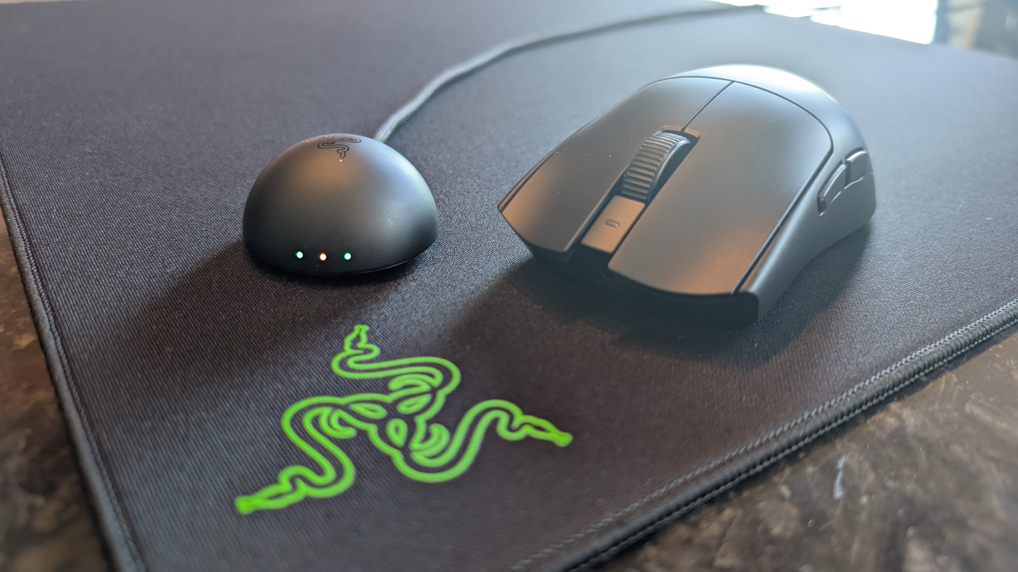 The Razer Viper V4 Pro gaming mouse pictured on the Razer Gigantus V2 Pro mouse mat.