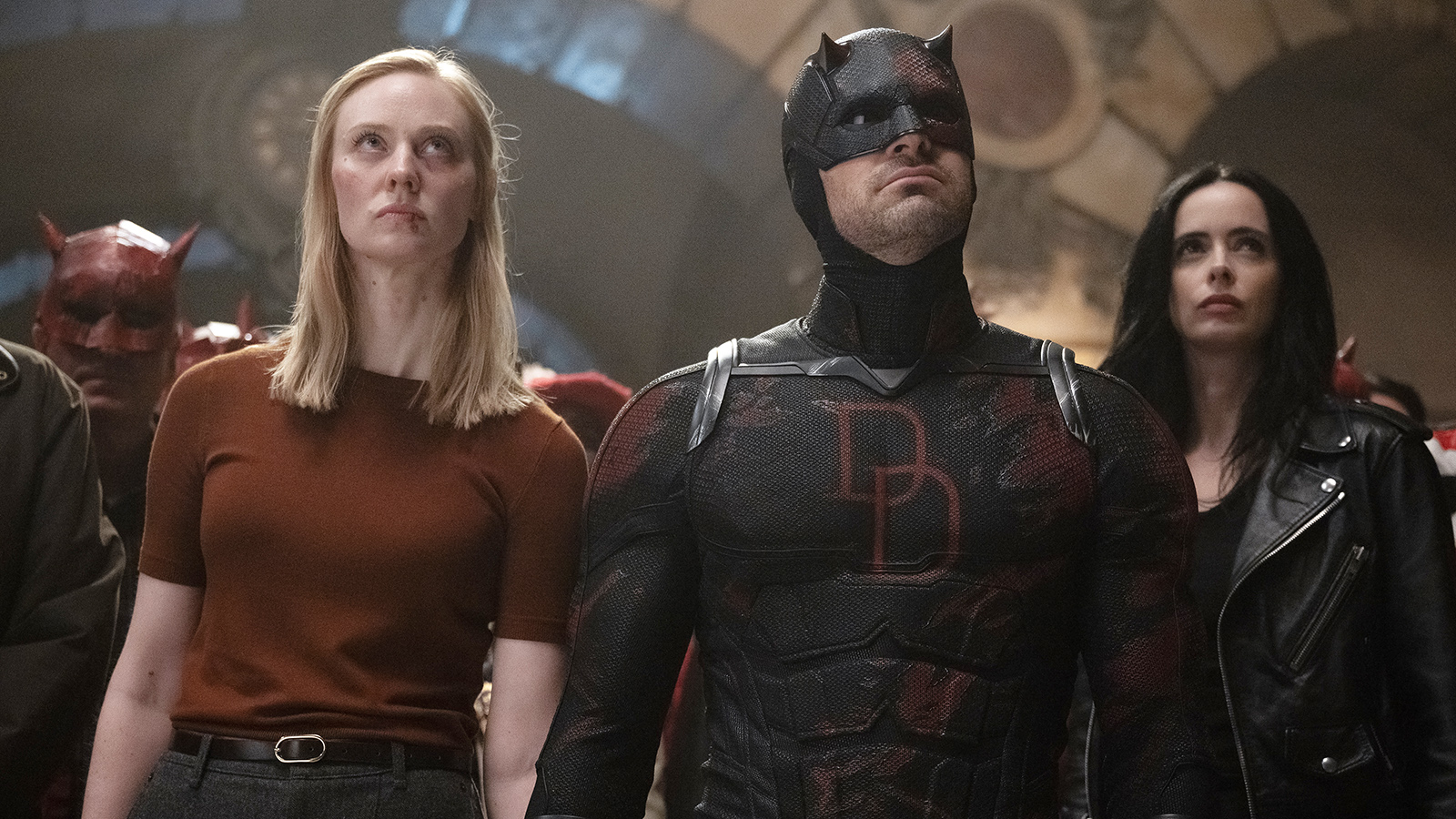 Karen Page, Matt Murdock, and Jessica Jones looking up at an off-screen Wilson Fisk in Daredevil: Born Again season 2 episode 8