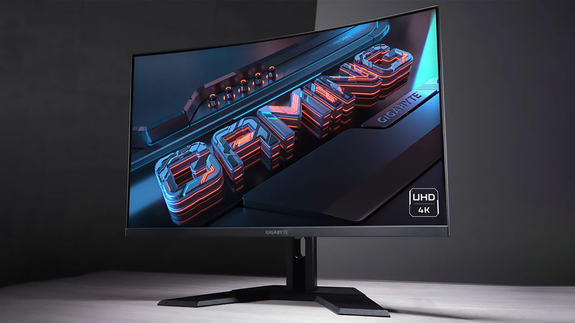 Gigabyte M32UC against a gray background