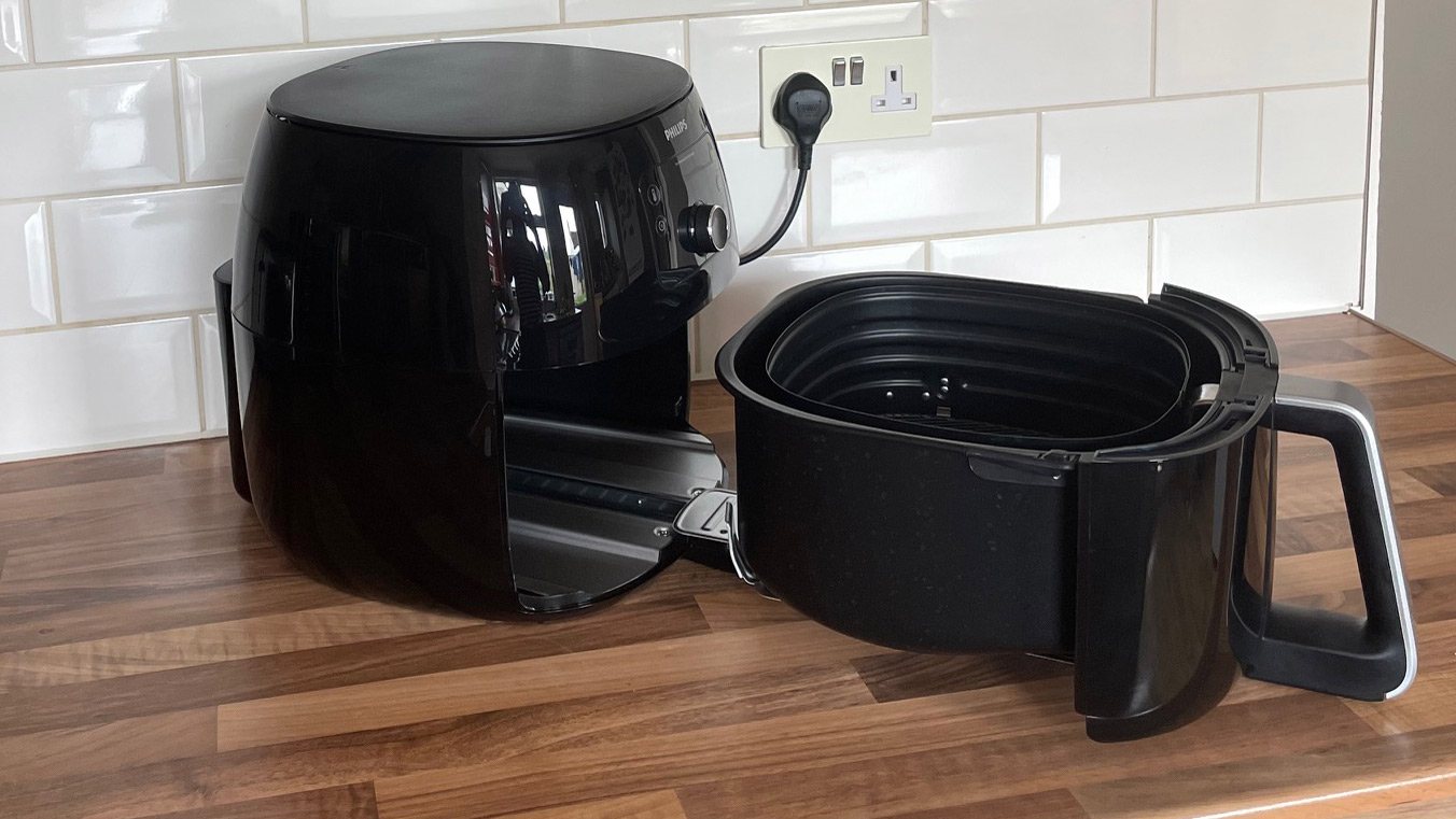 The drawer of the Philips Airfryer XXL HD9650/99 extended on its runners