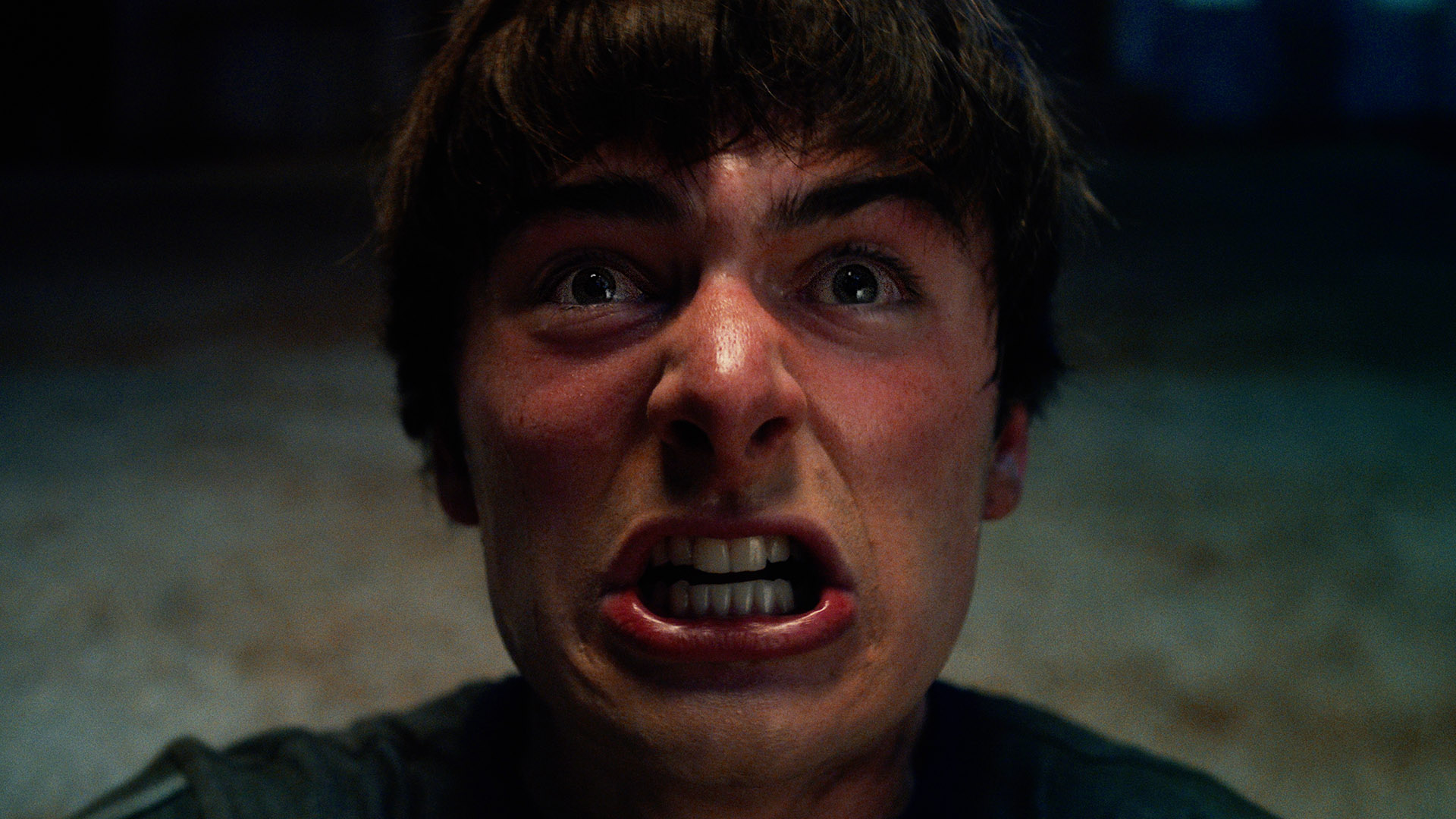 A close up of Will Byers about to scream in Stranger Things season 5