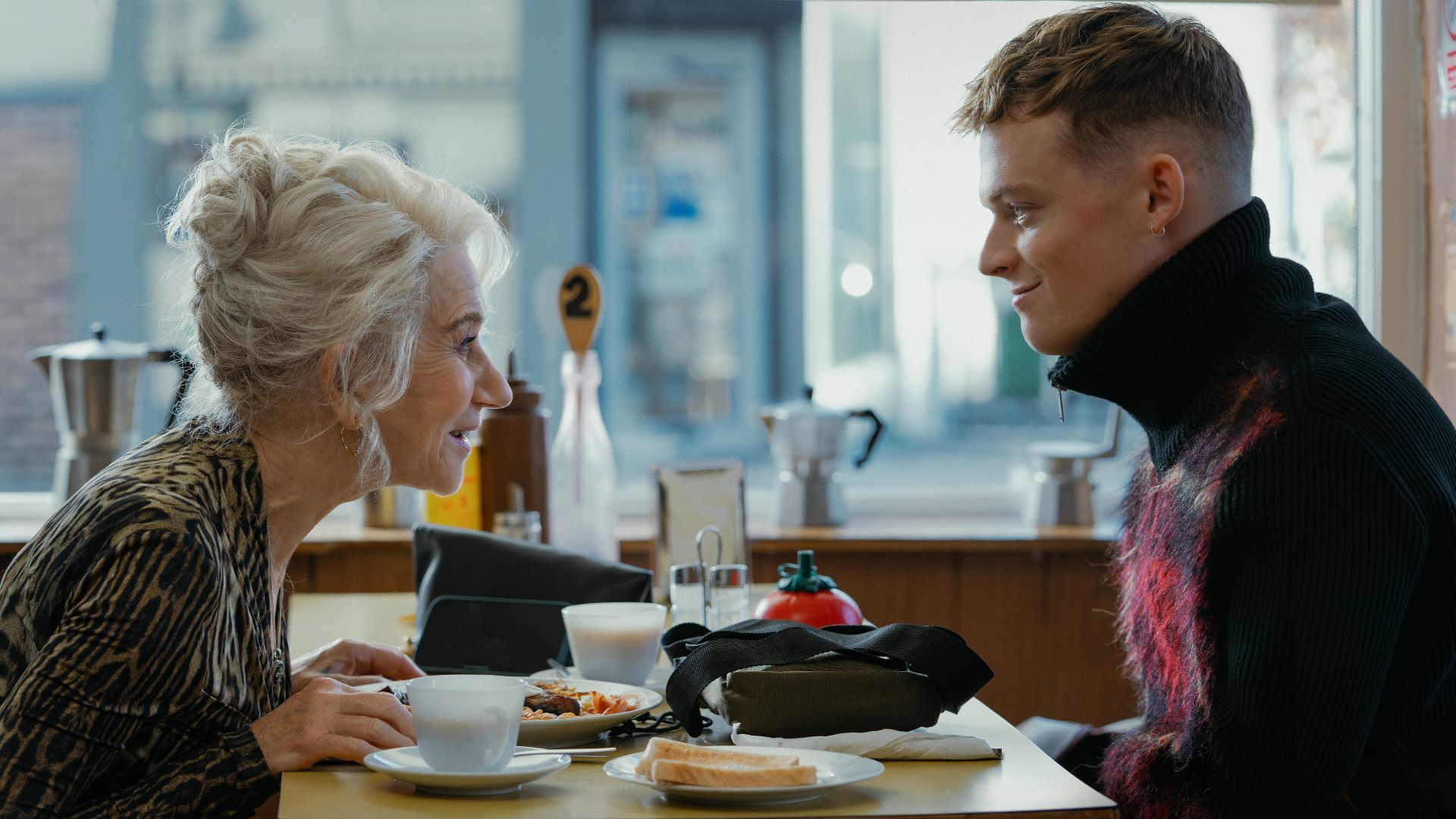 Maeve and Eddie talk over a greasy spoon cafe breakfast