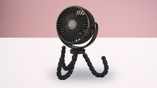 Aldi tripod fan on white and pink background