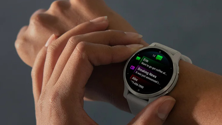 Woman using Garmin Venu 2 watch