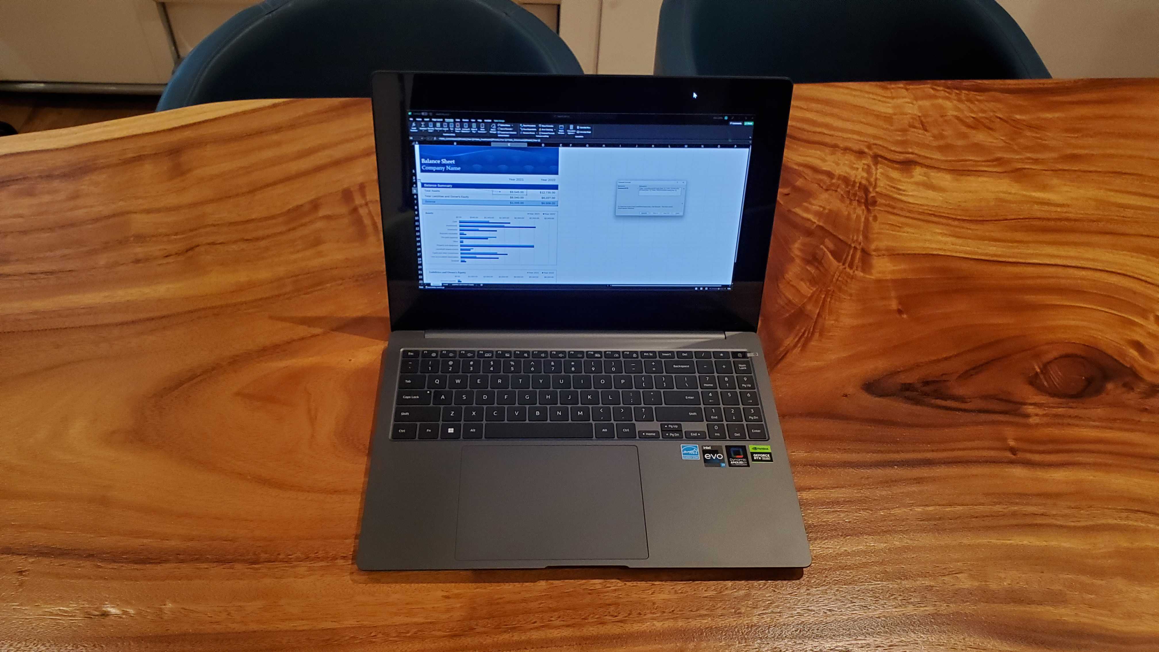 black Ultrabook open and excel doc displayed