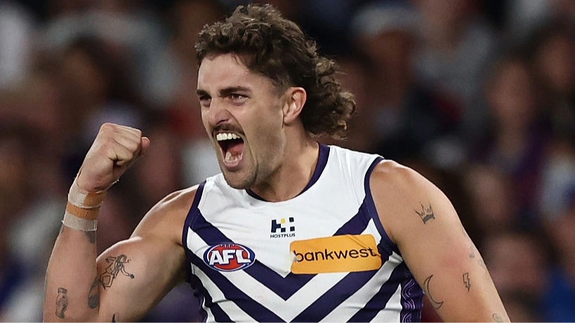 Luke Jackson of the Dockers punches his fist in celebration during the AFL 2026