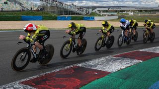 Team Visma-Lease a Bike's riders including Danish rider Jonas Vingegaard (L) cycle during the 3rd stage of the Paris-Nice cycling race, a 28,4 km team time trial between Nevers Magny-Cours Circuit and Nevers, on March 11, 2025.